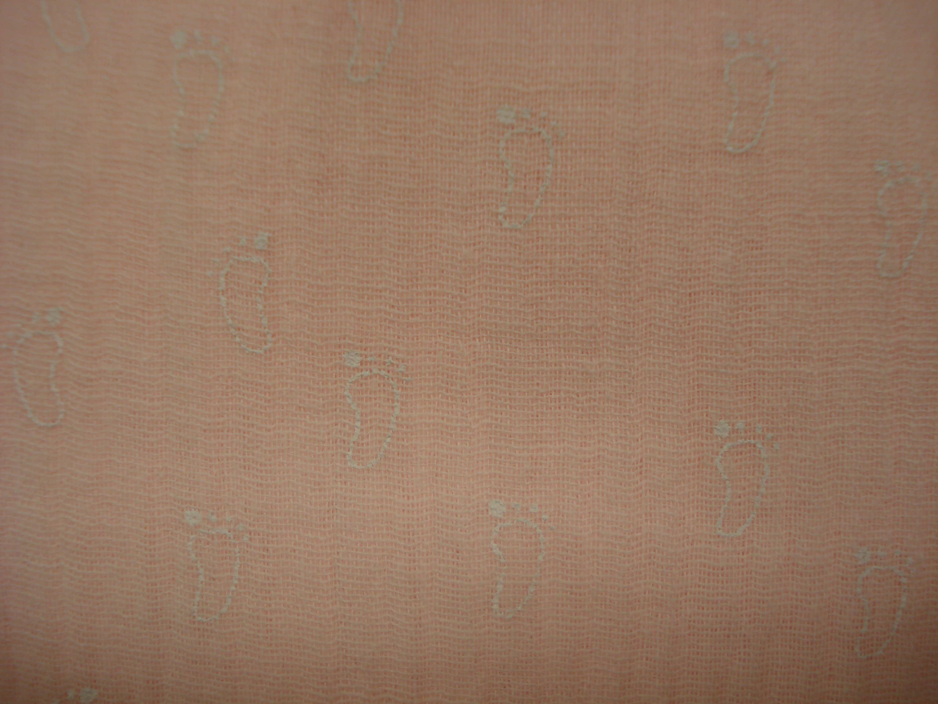 Hydrofiel katoen babyroze met witte voetjes print