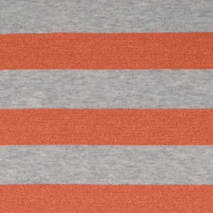 Katoenen tricot met metalic oranje streep € 10,00 p/m