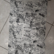 M 10 coupon 65cm x 150cm katoenen tricot krant